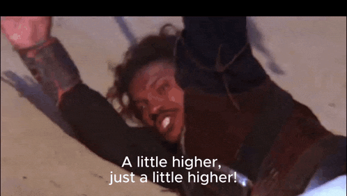 a man laying on the ground with the words " a little higher just a little higher " above him