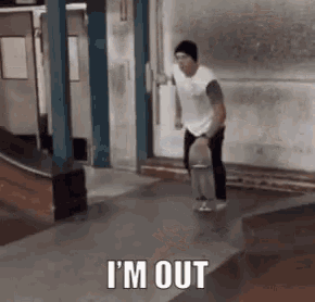 a man is riding a skateboard down a ramp at a skate park and says `` i 'm out '' .