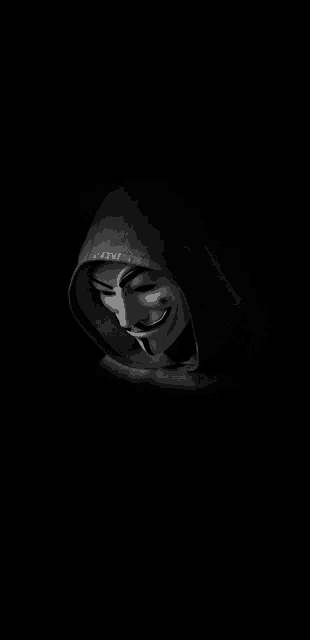 a black and white photo of a person wearing a mask and a hoodie .