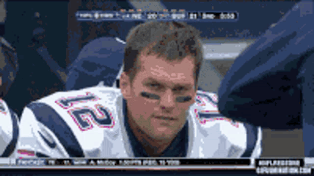 a football player with the number 12 on his uniform