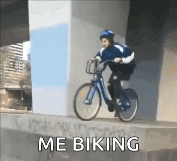a man is riding a bicycle on a bridge and the words me biking are written on the bottom of the picture .