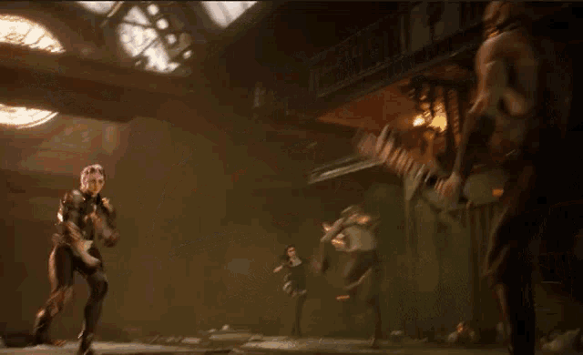 a group of people are fighting in a dark room with a clock tower in the background .