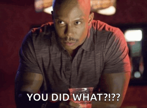 a man sitting at a bar with a drink in his hand and the words " you did what " written on the bottom