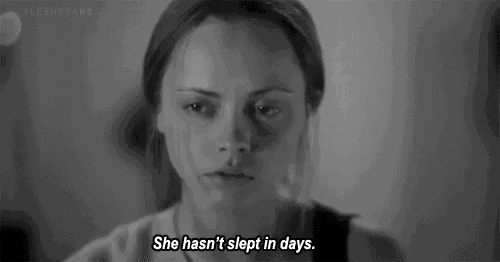 a black and white photo of a woman with the words she has n't slept in days