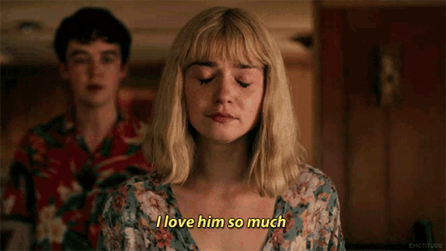 a woman says i love him so much in front of a man in a hawaiian shirt
