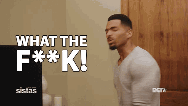 a man in a grey shirt says what the f *** k