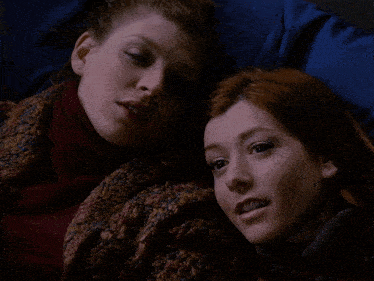 two women laying on a bed with the words hence the name
