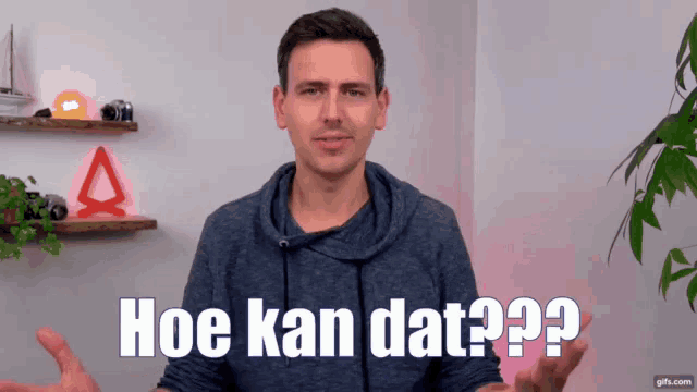 a man in a blue sweatshirt says hoe kan dat ??