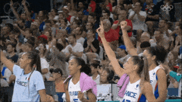 a group of female basketball players with france on their shirts