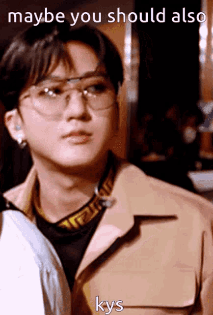 a picture of a young man with glasses and the words maybe you should also kys on the bottom