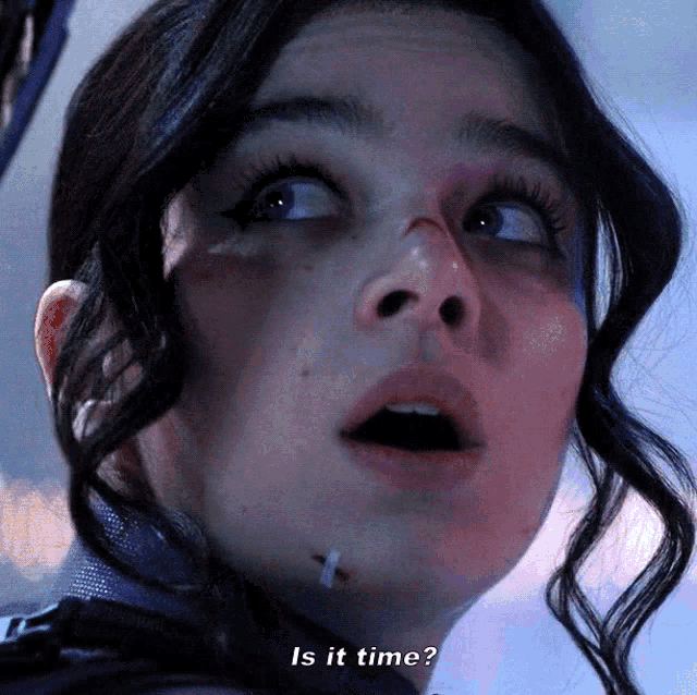 a close up of a woman 's face with the words is it time written below her