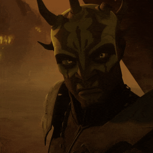 a close up of a cartoon character with horns