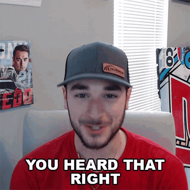a man wearing a hat and red shirt says you heard that right