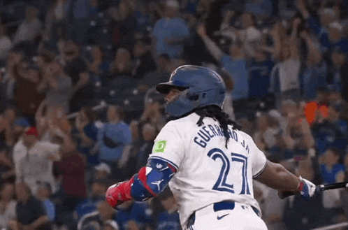 a baseball player for the blue jays celebrates his home run