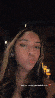 a blurry photo of a woman with the caption not one vid came out cute this day