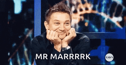 a man with his hands on his face and the words mr marrrrk above him