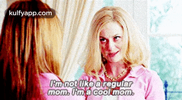 a woman in a pink shirt says i 'm not like a regular mom . i 'm a cool mom
