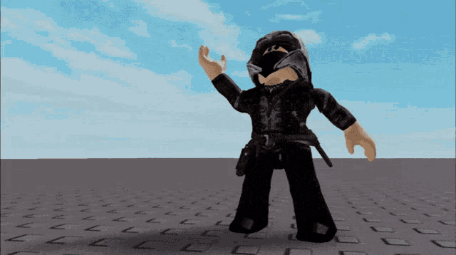 a roblox character wearing a black hooded jacket and pants