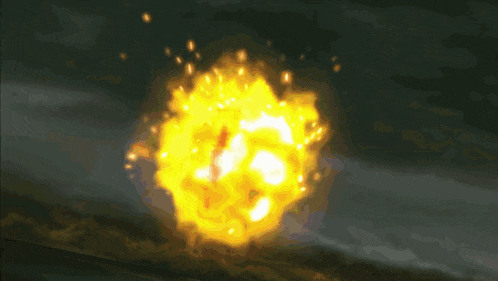 a large fireball is exploding in the dark sky
