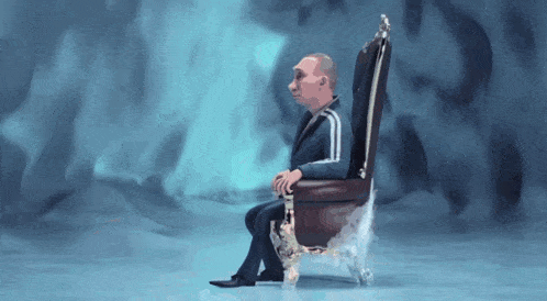 a man in a suit sits in a chair with a crown on it