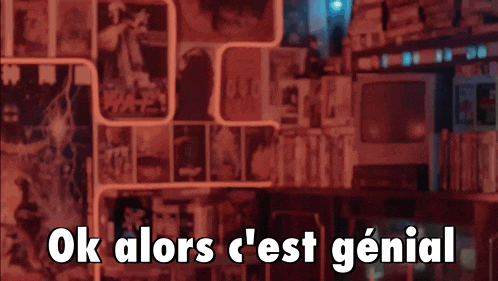 a man standing in front of a wall with the words ok alors c'est genial written on it