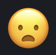 a yellow smiley face with a surprised expression