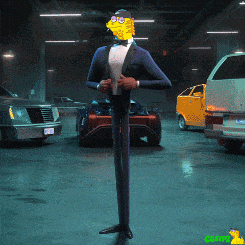 a man in a tuxedo is standing in a garage with cars
