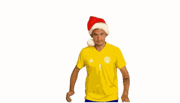a man wearing a santa hat and a yellow shirt with the number 1