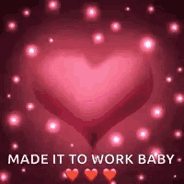 a pink heart with the words `` made it to work baby ''
