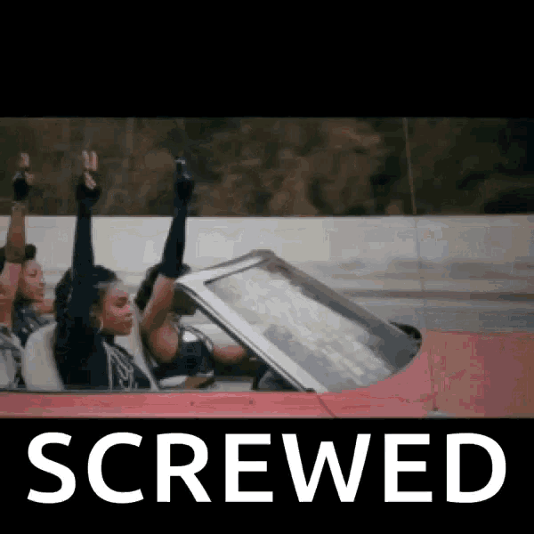a group of women are riding in a red car with the word screwed on the bottom