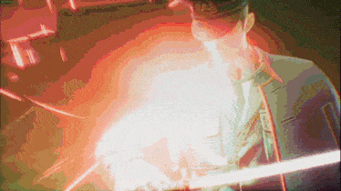 a man in a military uniform is holding a light saber in front of a red background