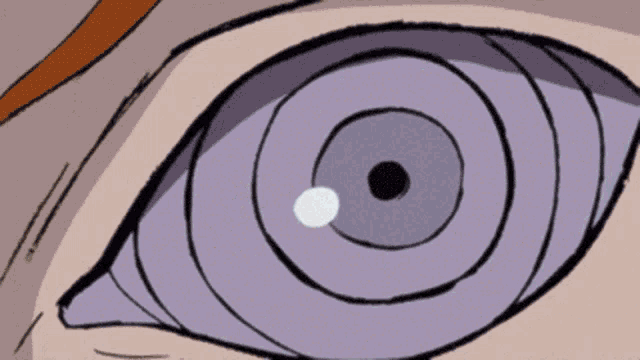 a close up of a person 's purple eye with a white dot in it