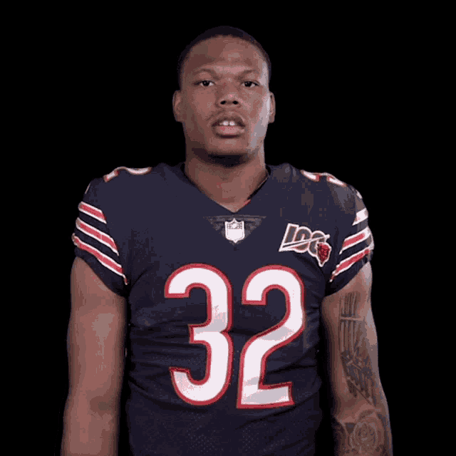 a football player with the number 32 on his shirt