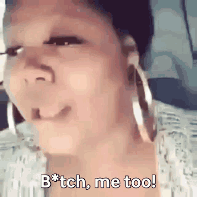 a close up of a woman 's face with the words bitch me too