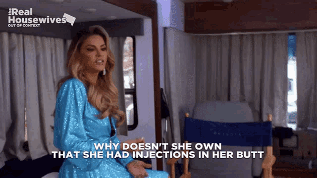 a woman in a blue sequined dress says why does n't she own that she had injections
