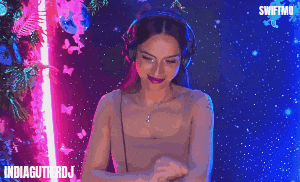 a woman wearing headphones is playing music and the words indiagutierdj are on the bottom