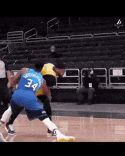 a basketball player with the number 34 on his back