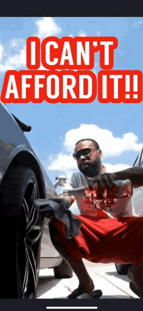 a man kneeling down next to a car with the words " i can 't afford it "