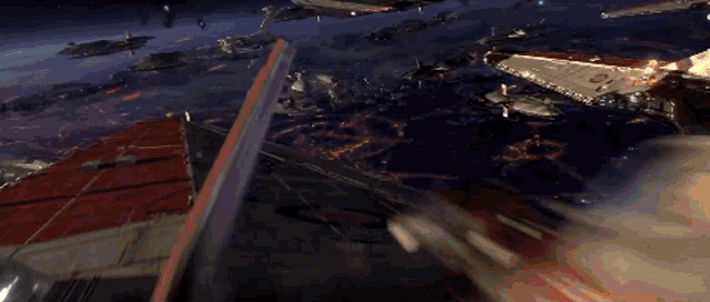 a bunch of spaceships are flying in the sky at night