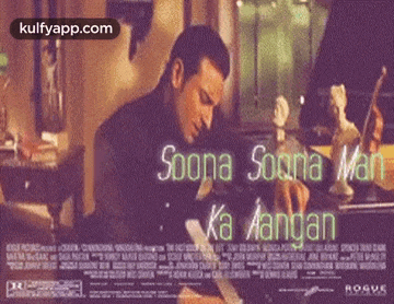 a man is playing a piano in a movie poster