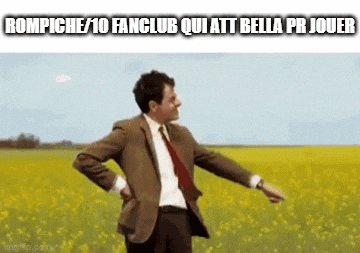 mr bean is dancing in a field of yellow flowers .