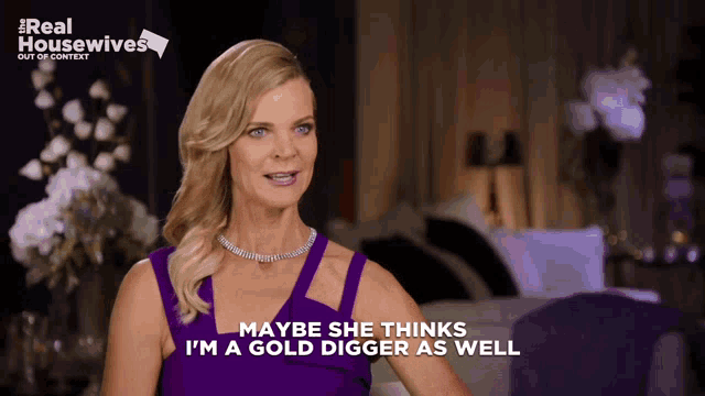 a woman says maybe she thinks i 'm a gold digger as well while wearing a purple dress