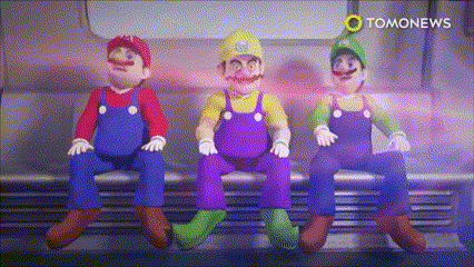 three mario dolls are sitting next to each other on a subway car .