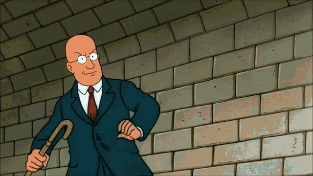 a bald man in a suit and tie holds a cane