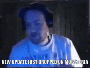 a man wearing headphones and a white shirt says new update just dropped on mobsteria