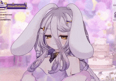 a girl with bunny ears is on a screen with the name henya the genius on it