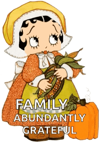 a picture of betty boop holding corn and a pumpkin