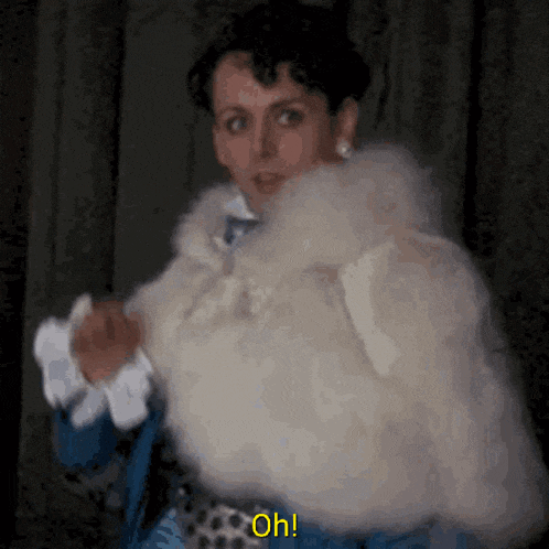 a woman in a fur coat says oh in yellow