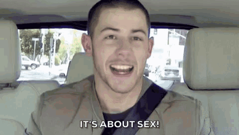 a man is sitting in the back seat of a car and saying `` it 's about sex ! ''