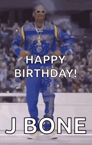snoop dogg is dancing on a stage and saying `` happy birthday ! ''